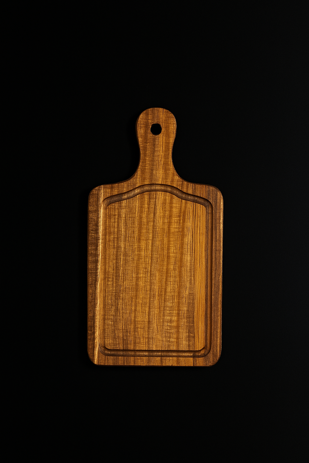 Wooden cutting board with a handle on a black background